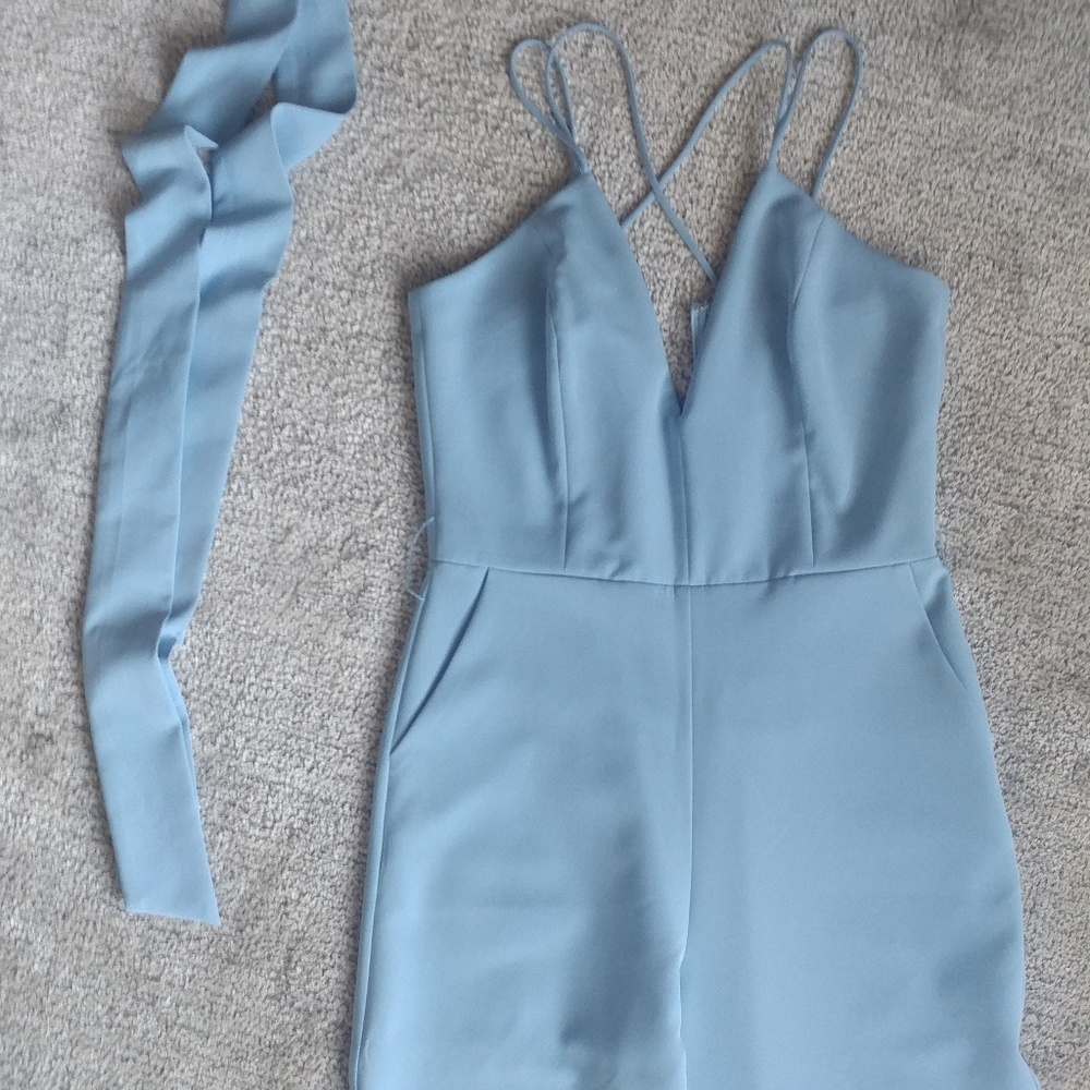 Light blue jumpsuit w/ criss-cross back